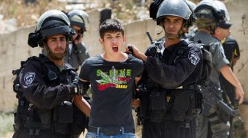 Palestinian-youth-arrested-by-Israeli-soldiers-in-Beit-Hanina