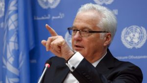 Russia's United Nations Ambassador Vitaly Churkin chooses a reporter to ask a question during a news conference marking the start of his month-long term as president of the U.N. Security Council at the U.N. headquarters in New York June 3, 2014. REUTERS/Lucas Jackson (UNITED STATES - Tags: POLITICS) - RTR3S1Q1